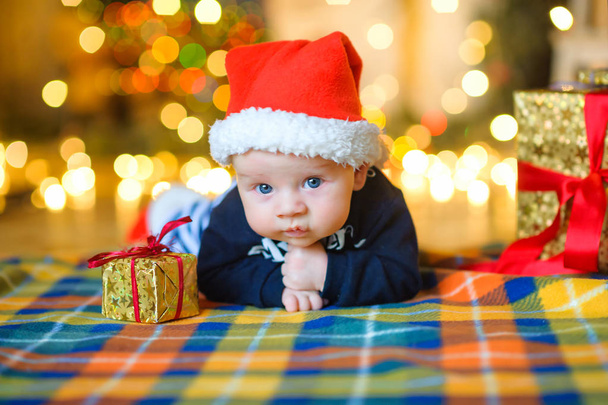 Baby to Santa Claus's cap - Photo, image