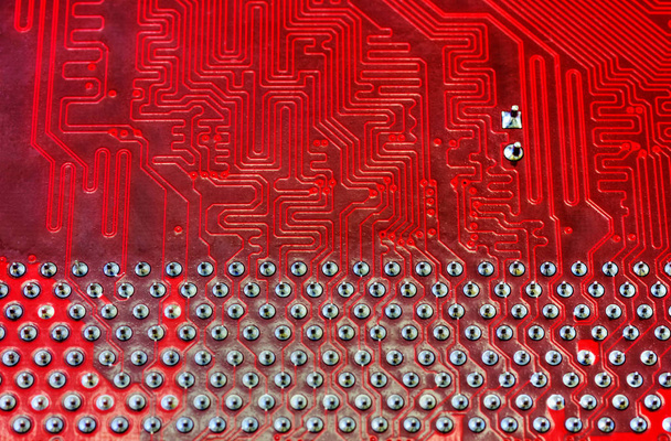 Fondo tecnológico con placa madre de computadora roja
 - Foto, imagen
