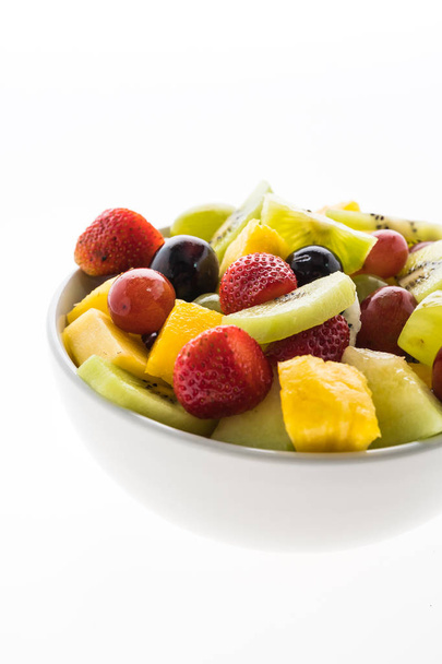 Змішані фрукти в білій тарілці
 - Фото, зображення