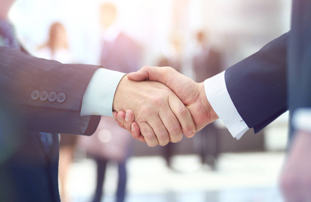 Conceito de parceria - parceiros de negócio handshake
 - Foto, Imagem