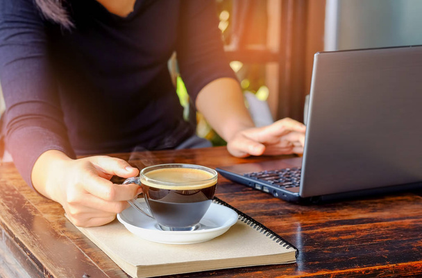 Business people working laptop with coffee on table. - Photo, image