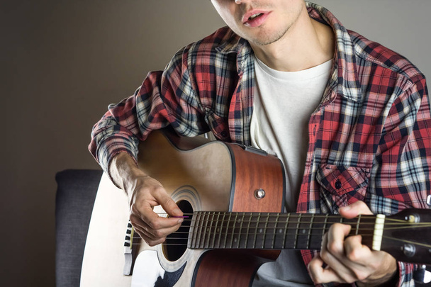 Male musician singing song  - Фото, зображення