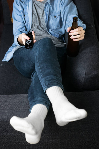 Having rest and drink on couch - Foto, Imagen