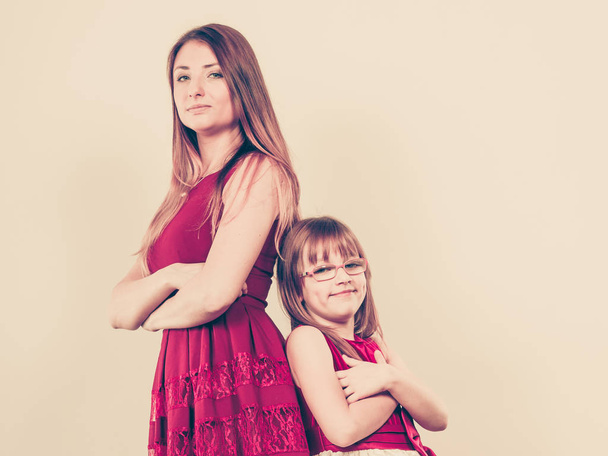 Mother and daughter posing together - Foto, afbeelding