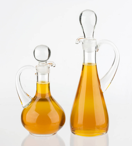 Vegetable oil glass bottle isolated on white background - Foto, imagen
