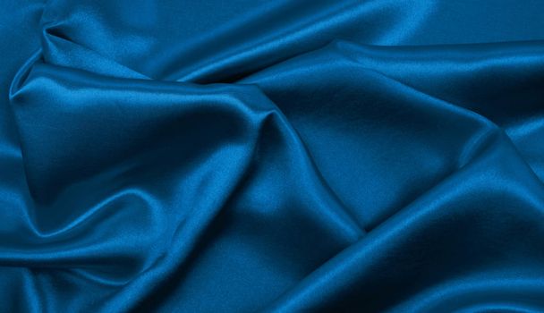 Smooth elegant blue silk or satin luxury cloth texture as abstra - Foto, immagini