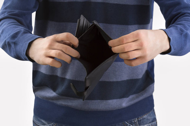 man holding an empty wallet - Foto, Imagen