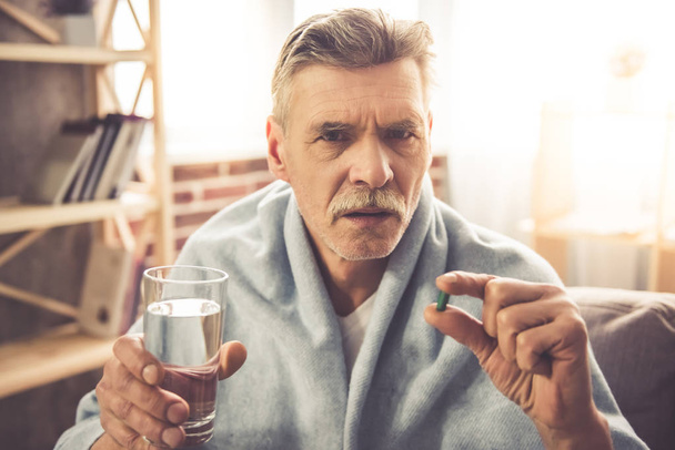 Mature man having a cold - Photo, Image
