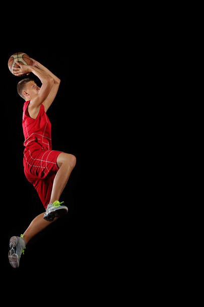 Basketball player with a ball - 写真・画像