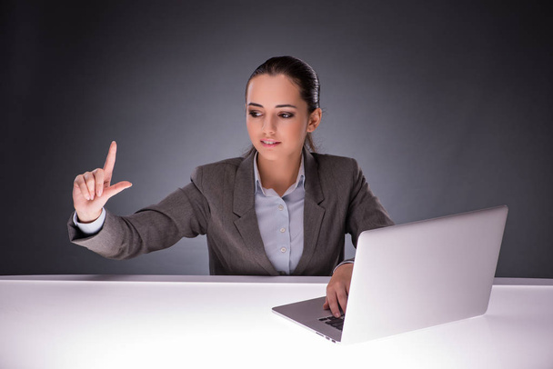 Businesswoman with laptop in business concept - Foto, Bild