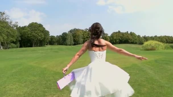 Back view of running bride. - Footage, Video