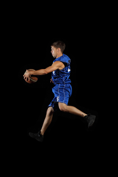 Basketball player with a ball - Fotoğraf, Görsel