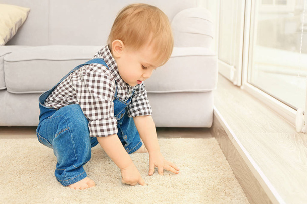 Adorable little boy playing in the room, closeup - Photo, image