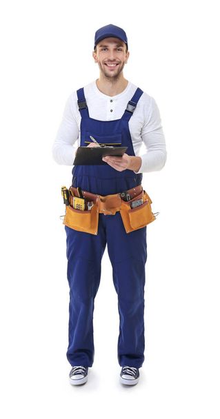 Plumber in uniform holding clipboard   - Photo, image