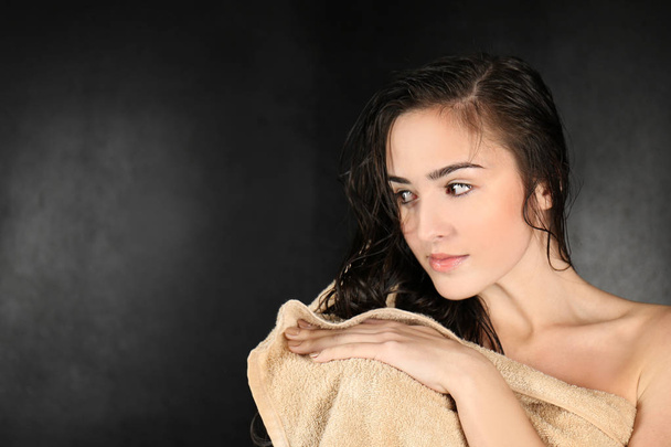 Young beautiful woman in towel   - Foto, Imagem