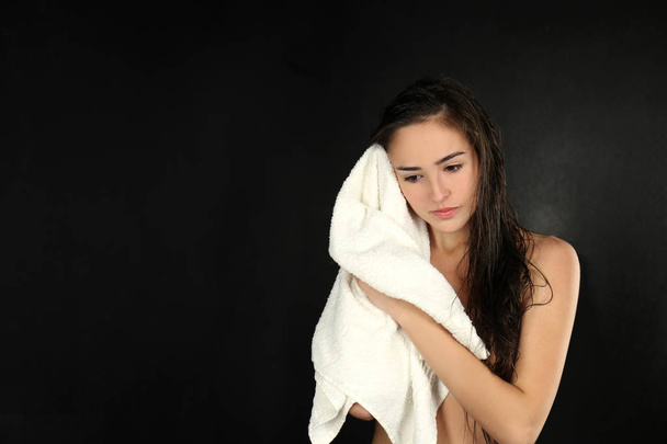 woman towel drying her hair  - Fotó, kép