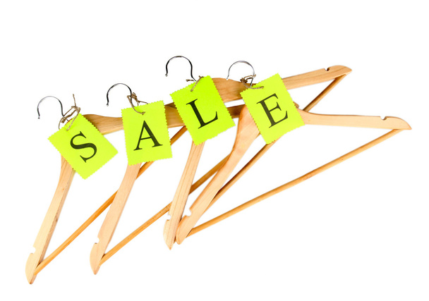 coat hangers with sale tag isolated on white background - 写真・画像