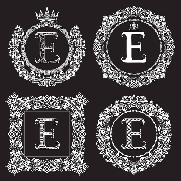 Vintage monogrammen set van E-brief. Heraldische wapenschilden in kransen, ronde en vierkante kaders. - Vector, afbeelding