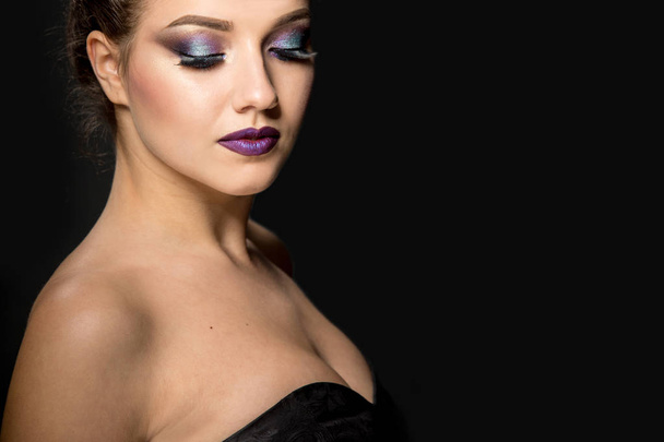 fashion studio portrait of beautiful young woman with bright makeup - Photo, image