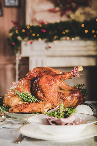 Roasted turkey on holiday table - Fotó, kép