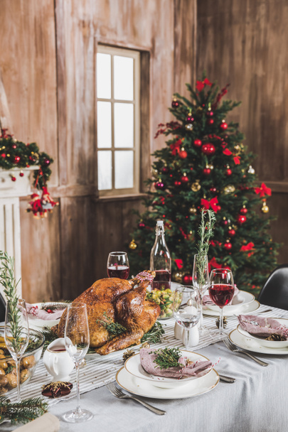 Roasted turkey on holiday table   - Photo, image