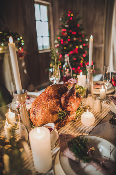 Roasted turkey on holiday table - Foto, Imagen