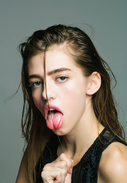 Pretty sexy girl shows tongue - Foto, Imagem