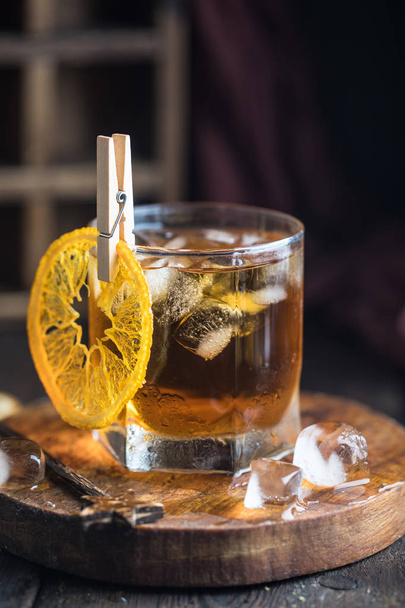 Cocktail with iced tea, whiskey and orange - Fotoğraf, Görsel