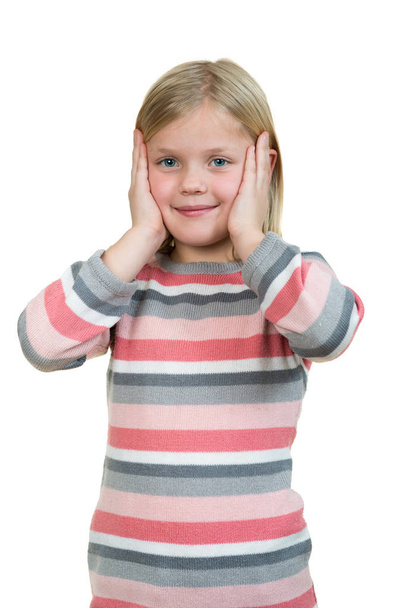 Cute girl is holding her face in astonishment  - Фото, зображення