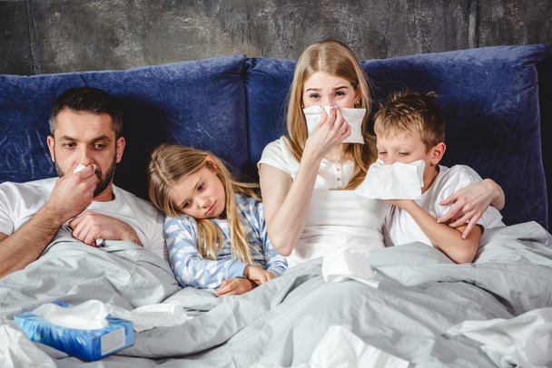 Sick family on bed - Photo, Image