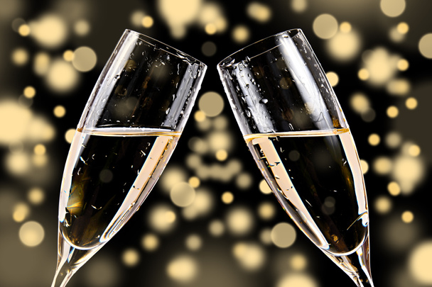 Champagne glasses on bokeh background - Photo, Image