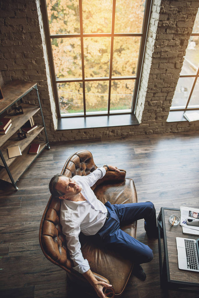 Tired businessman having some rest - Photo, Image