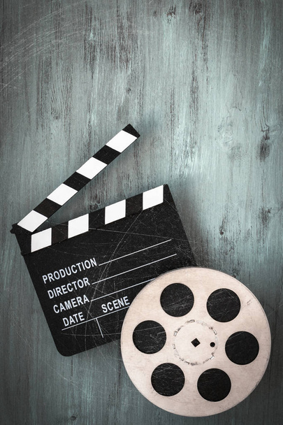 Clapperboards and the reel of film - Photo, image