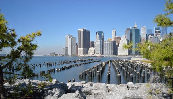 Manhattan and old pier pylons. - Photo, Image