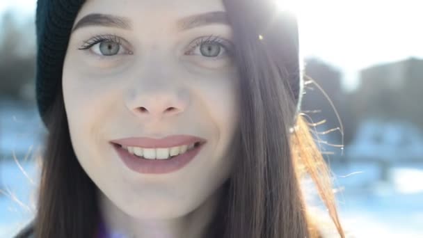 young beautiful woman in winter - Filmati, video