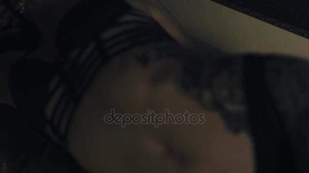 Close up shot of finished tattoo on womans body - Кадри, відео