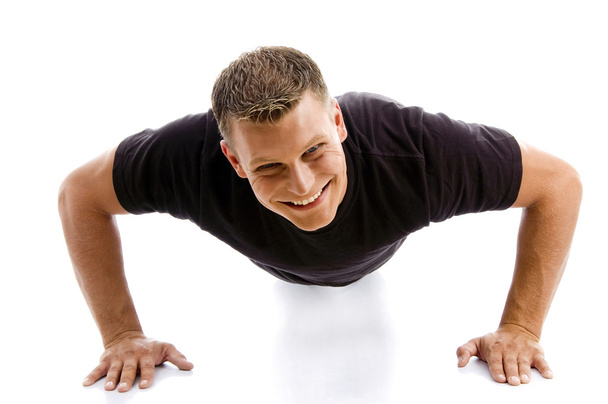 Muscular male doing push ups - Foto, immagini