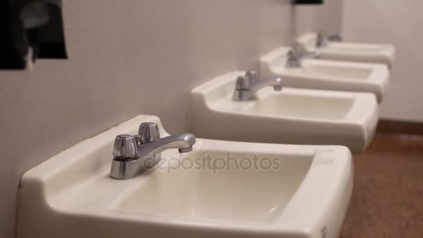 Dripping facet inside public washroom - Footage, Video