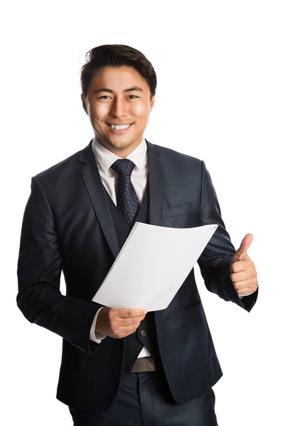 Attractive businessman with document - 写真・画像