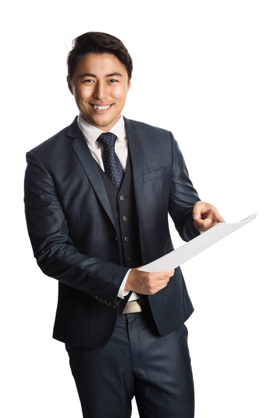 Attractive businessman with document - Photo, image