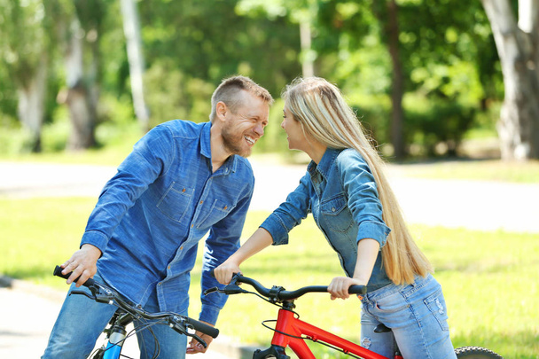 Happy couple with bicycle - Photo, Image