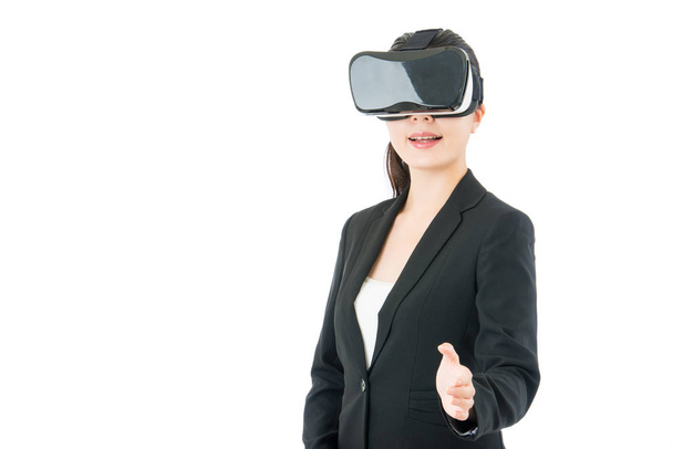 asian business woman handshake by VR headset glasses - Foto, afbeelding
