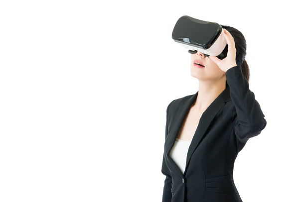 beauty asian woman look through VR glasses for business - Foto, Imagem