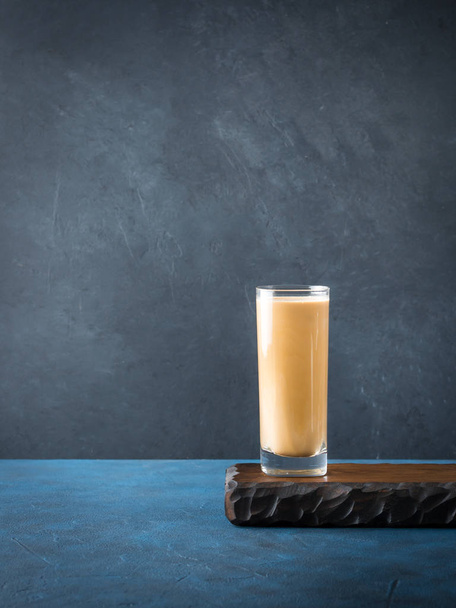 Long glass with coffee and cream. Vertical copy space - Foto, immagini
