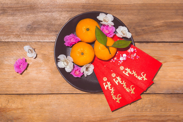 Mandarijn en Lunar New Year met tekst "Happy New Year"  - Foto, afbeelding
