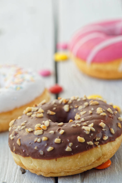 Donuts coloridos diferentes
 - Foto, Imagem