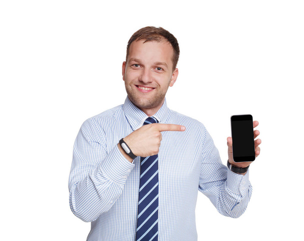 Mladý podnikatel s mobilním telefonem izolované na bílém - Fotografie, Obrázek