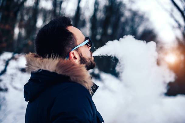 Man smoking  electronic cigarette  - Fotó, kép
