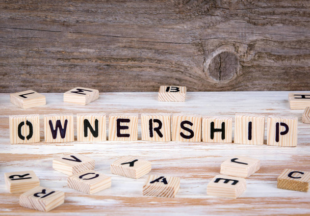 Ownership from wooden letters - Фото, изображение