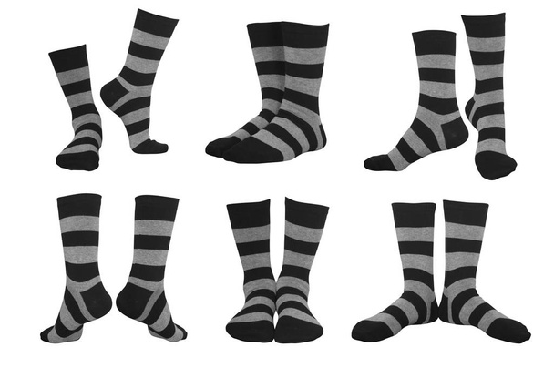 készlet-ból különböző pózok, elszigetelt csíkos zokni - Fotó, kép